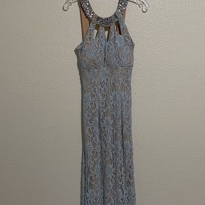 Baby blue Jodi Kristopher sleeveless maxi prom dress with a beaded detailed top